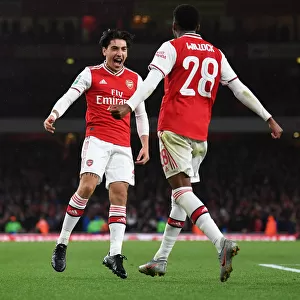 Arsenal's Joe Willock and Hector Bellerin Celebrate Goal: Carabao Cup Victory over Nottingham Forest