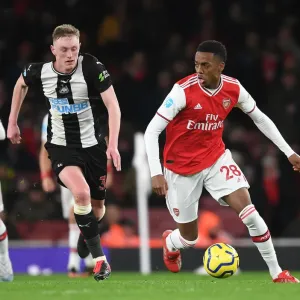 Arsenal's Joe Willock Outmaneuvers Newcastle's Sean Longstaff in Premier League Clash Arsenal's Joe Willock Outmaneuvers Newcastle's Sean Longstaff in Premier League Clash
