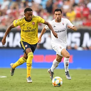 Arsenal's Joe Willock vs. Fiorentina's Jaime Baez: A Battle in the International Champions Cup, Charlotte 2019