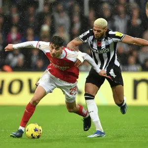 Arsenal's Kai Havertz Faces Off Against Newcastle's Joelinton in Premier League Clash (2023-24)