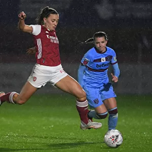 Arsenal's Katie McCabe Battles for Possession in Empty FA WSL Match Against West Ham United