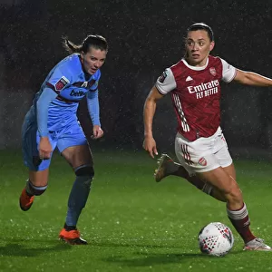 Arsenal's Katie McCabe Fights for Possession in Empty FA WSL Stadium Against West Ham United Women (2021)
