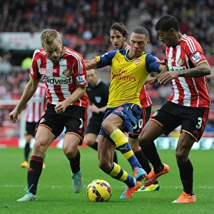 Arsenal's Kieran Gibbs Outmaneuvers Larsson and van Aanholt during Sunderland Clash