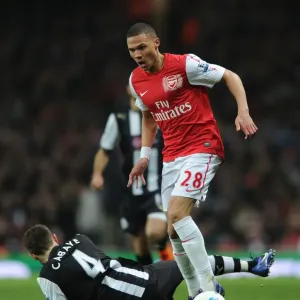 Arsenal's Kieran Gibbs Outmaneuvers Newcastle's Yohan Cabaye during the 2011-12 Premier League Match Arsenal's Kieran Gibbs Outmaneuvers Newcastle's Yohan Cabaye during the 2011-12 Premier League Match