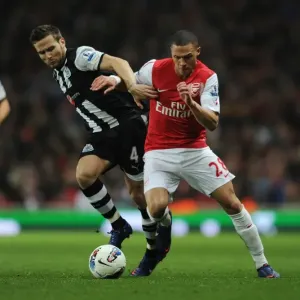 Arsenal's Kieran Gibbs Outsmarts Yohan Cabaye: A Premier League Showdown (2011-12) Arsenal's Kieran Gibbs Outsmarts Yohan Cabaye: A Premier League Showdown (2011-12)