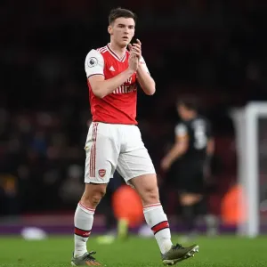 Arsenal's Kieran Tierney Celebrates with Fans after Victory over Brighton & Hove Albion
