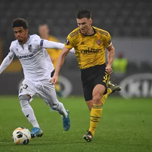 Arsenal's Kieran Tierney Clashes with Marcus Edwards in Europa League Battle