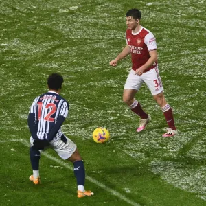 Arsenal's Kieran Tierney Clashes with Matheus Pereira in West Bromwich Albion vs Arsenal Premier League Match