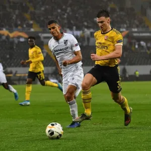 Arsenal's Kieran Tierney Clashes with Vitoria Guimaraes Victor Garcia in Europa League Match Arsenal's Kieran Tierney Clashes with Vitoria Guimaraes Victor Garcia in Europa League Match