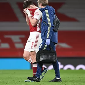 Arsenal's Kieran Tierney Exits with Injury as Arsenal v Liverpool Plays Behind Closed Doors (2020-21)