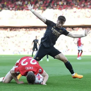 Arsenal's Kieran Tierney Faces Off Against Nottingham Forest's Ryan Yates in Premier League Clash