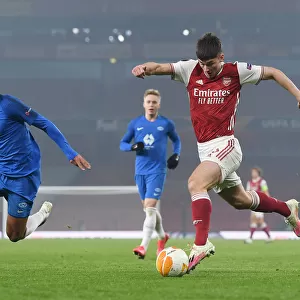 Arsenal's Kieran Tierney Fends Off Molde's Henry Wingo in Europa League Clash