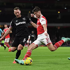 Arsenal's Kieran Tierney Fends Off West Ham's Vladimir Coufal in Premier League Clash