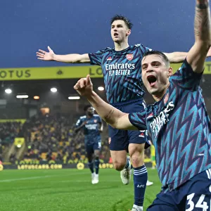 Arsenal's Kieran Tierney and Granit Xhaka Celebrate Goals Against Norwich City (December 2021)