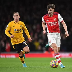 Arsenal's Kieran Tierney Outmaneuvers Wolves Daniel Podence in Premier League Clash