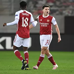 Arsenal's Kieran Tierney and Thomas Partey Celebrate Goals Against SL Benfica in Europa League