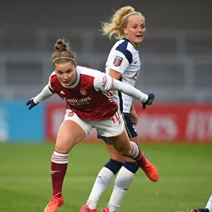 Arsenal's Kim Little Dazzles with Agile Footwork Against Tottenham's Chloe Peplow in FA Cup Clash
