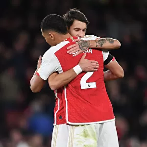 Arsenal's Kiwior and Saliba Celebrate Victory Over Burnley in 2023-24 Premier League