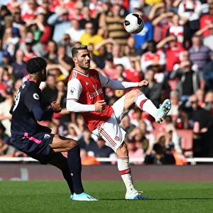 Arsenal's Kolasinac Outmaneuvers Bournemouth's Billings in Premier League Clash