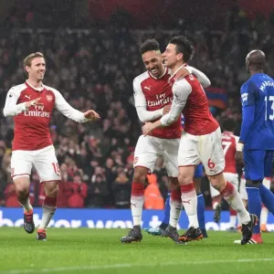Arsenal's Koscielny, Aubameyang, and Monreal Celebrate Goal Against Everton (2017-18)