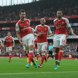 Arsenal's Koscielny and Coquelin: Celebrating a Goal Against Southampton (2016-17)