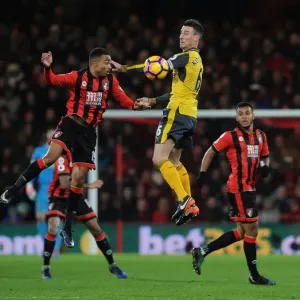 Arsenal's Koscielny Heads Away from Stanislas in AFC Bournemouth Clash (2016-17)