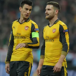 Arsenal's Koscielny and Mustafi Face Off Against Bayern Munich in Champions League Showdown Arsenal's Koscielny and Mustafi Face Off Against Bayern Munich in Champions League Showdown