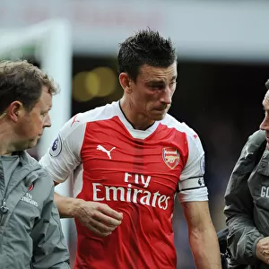 Arsenal's Koscielny Receives Medical Attention During Arsenal vs Southampton Match, 2016-17