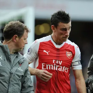 Arsenal's Koscielny Receives Medical Attention During Arsenal vs Southampton Match, 2016-17