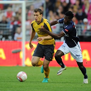 Arsenal's Krystian Bielik Outmuscles Usman Sala in Exciting Pre-Season Clash