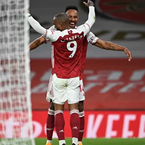 Arsenal's Lacazette and Aubameyang Celebrate Goal Against West Ham in Premier League (2020-21)
