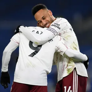 Arsenal's Lacazette and Aubameyang: A Deadly Duo Celebrates Goal Scoring Success Against Brighton & Hove Albion