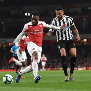 Arsenal's Lacazette Clashes with Newcastle's Lascelles in Premier League Showdown Arsenal's Lacazette Clashes with Newcastle's Lascelles in Premier League Showdown