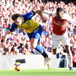 Arsenal's Lacazette Clashes with Southampton's Vestergaard in Premier League Showdown Arsenal's Lacazette Clashes with Southampton's Vestergaard in Premier League Showdown