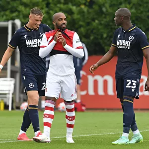 Arsenal's Lacazette Engages with Millwall's Afobe and Ballard during Pre-Season Friendly