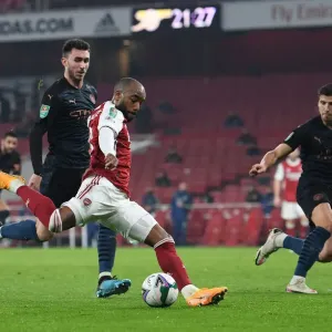 Arsenal's Lacazette Faces Off Against Manchester City's Laporte and Dias in Carabao Cup Quarterfinal Showdown Arsenal's Lacazette Faces Off Against Manchester City's Laporte and Dias in Carabao Cup Quarterfinal Showdown