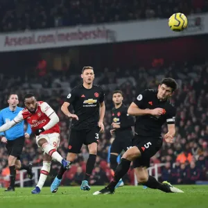 Arsenal's Lacazette Faces Off Against Matic in Intense Arsenal v Manchester United Clash (2019-20) Arsenal's Lacazette Faces Off Against Matic in Intense Arsenal v Manchester United Clash (2019-20)