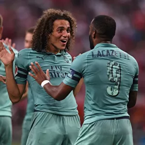 Arsenal's Lacazette and Guendouzi Celebrate Goal Against Paris Saint-Germain in 2018 (ICC Singapore)