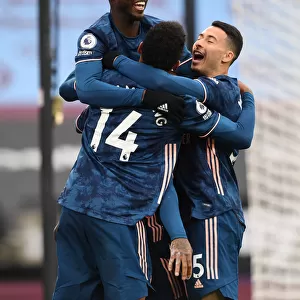 Arsenal's Lacazette, Pepe, Aubameyang, and Martinelli Celebrate Goals Against West Ham in Premier League