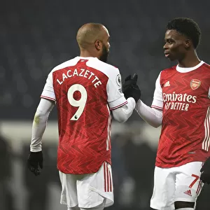 Arsenal's Lacazette and Saka Celebrate Third Goal vs. West Bromwich Albion (2020-21)