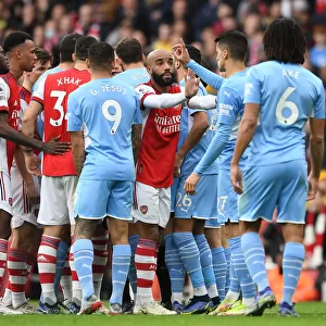 Arsenal's Lacazette Tries to Rally Team Against Manchester City in Premier League Clash
