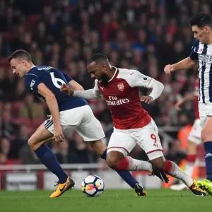 Arsenal's Lacazette Tripped by Evans and Barry in Premier League Clash vs. West Bromwich Albion Arsenal's Lacazette Tripped by Evans and Barry in Premier League Clash vs. West Bromwich Albion
