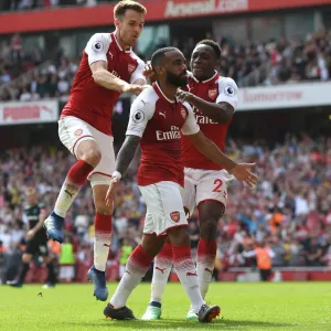 Arsenal's Lacazette, Welbeck, and Ramsey Celebrate Goals Against West Ham Arsenal's Lacazette, Welbeck, and Ramsey Celebrate Goals Against West Ham
