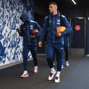 Arsenal's Lacazette and Xhaka in Action against Tottenham in the 2021-22 Premier League Arsenal's Lacazette and Xhaka in Action against Tottenham in the 2021-22 Premier League