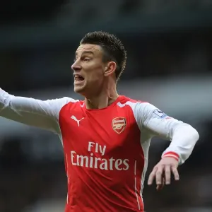 Arsenal's Laurent Koscielny in Action Against Tottenham Hotspur - Premier League 2014-15 Arsenal's Laurent Koscielny in Action Against Tottenham Hotspur - Premier League 2014-15