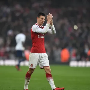 Arsenal's Laurent Koscielny Celebrates with Fans after Arsenal vs. Tottenham Match