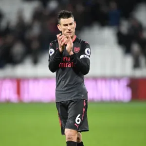 Arsenal's Laurent Koscielny Celebrates with Fans after West Ham Victory Arsenal's Laurent Koscielny Celebrates with Fans after West Ham Victory