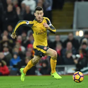 Arsenal's Laurent Koscielny Faces Off Against Liverpool at Anfield (Premier League 2016-17) Arsenal's Laurent Koscielny Faces Off Against Liverpool at Anfield (Premier League 2016-17)