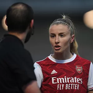 Arsenal's Leah Williamson Engages with Assistant Referee Amid Empty Meadow Park (FA WSL 2021)