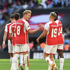 Arsenal's Leandro Trossard and Martin Odegaard Celebrate Goal: Arsenal vs Manchester City - FA Community Shield 2023-24